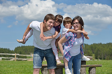 Image showing happy young family have fun outdoors