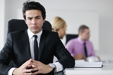 Image showing young business man at meeting