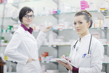 Image showing team of pharmacist chemist woman  in pharmacy drugstore