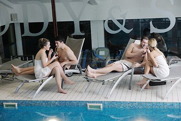 Image showing young people group at spa swimming pool