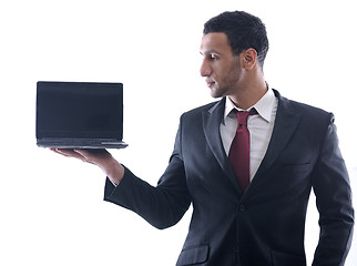 Image showing business man work on mini laptop