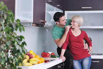 Image showing young couple have fun in modern kitchen