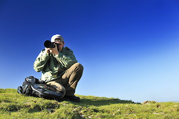 Image showing Nature photographer with digital camera