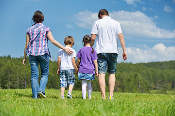 Image showing happy young family have fun outdoors