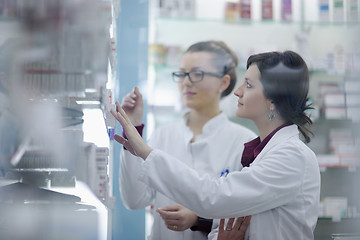 Image showing team of pharmacist chemist woman  in pharmacy drugstore