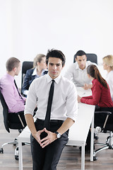 Image showing young business man at meeting