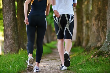 Image showing Young couple jogging