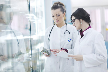 Image showing team of pharmacist chemist woman  in pharmacy drugstore