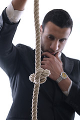 Image showing business man with rope isolated on white background