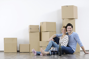 Image showing Young couple moving in new home