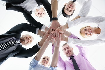 Image showing business people group joining hands