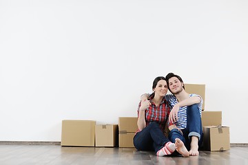 Image showing Young couple moving in new house