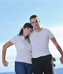 Image showing couple relaxing on balcony