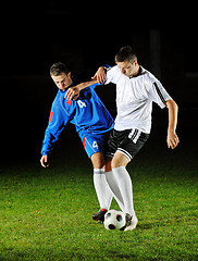 Image showing football players in action for the ball