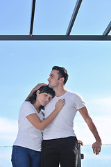 Image showing couple relaxing on balcony