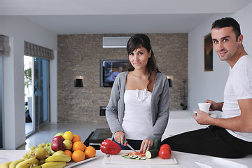 Image showing young couple have fun in modern kitchen