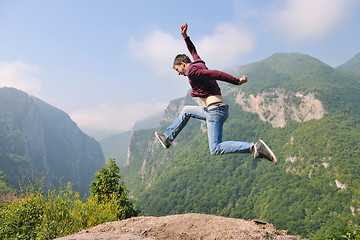 Image showing man jump in nature