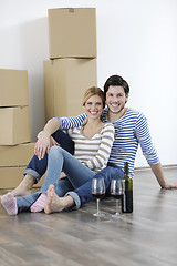 Image showing Young couple moving in new home