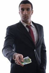 Image showing Business man holding money