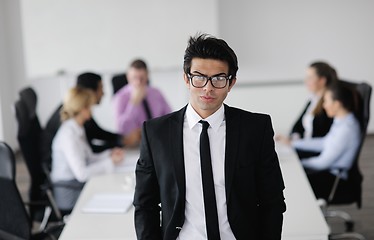 Image showing young business man at meeting