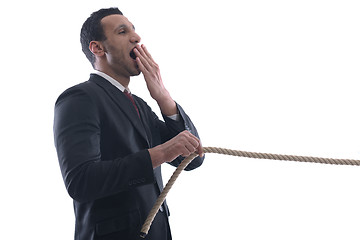 Image showing business man with rope isolated on white background