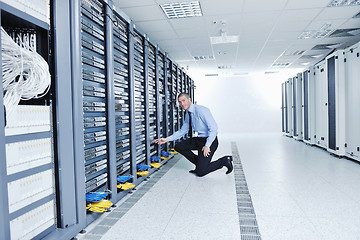 Image showing young it engineer in datacenter server room