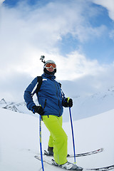 Image showing skiing on fresh snow at winter season at beautiful sunny day