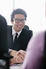 Image showing young business man at meeting