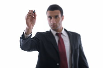 Image showing business man draw with marker on empty space