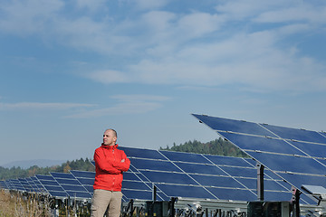 Image showing Male solar panel engineer at work place