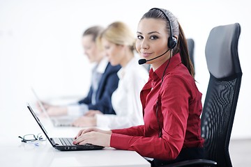 Image showing business woman group with headphones