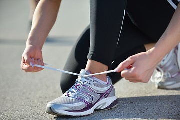 Image showing Young beautiful  woman jogging at morning in park