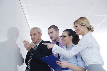 Image showing Senior business man giving a presentation