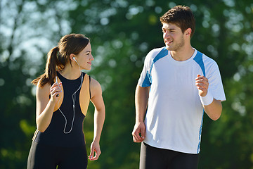 Image showing Young couple jogging at morning