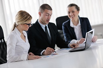 Image showing business people in a meeting at office