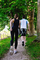 Image showing Young couple jogging