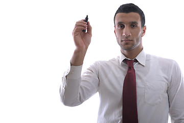 Image showing business man draw with marker on empty space