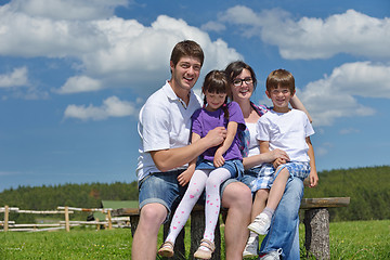 Image showing happy young family have fun outdoors