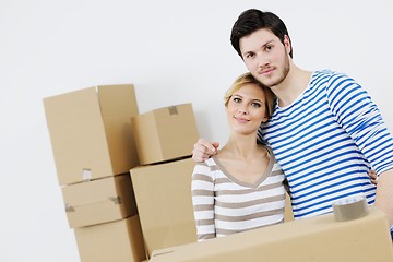 Image showing Young couple moving in new house