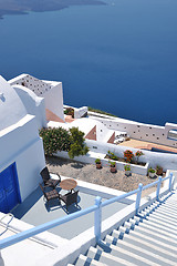 Image showing Greek woman on the streets of Oia, Santorini, Greece