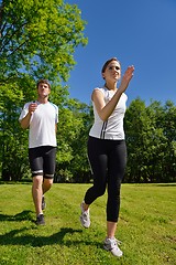 Image showing Young couple jogging at morning