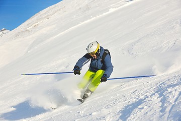 Image showing skiing on fresh snow at winter season at beautiful sunny day