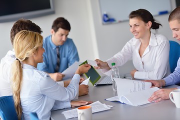 Image showing business people in a meeting at office