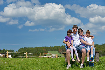 Image showing happy young family have fun outdoors