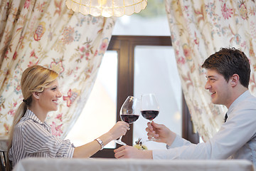 Image showing young couple having dinner at a restaurant