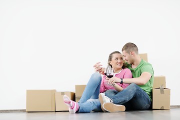 Image showing Young couple moving in new house