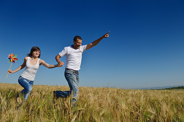 Image showing happy couple in wheat field