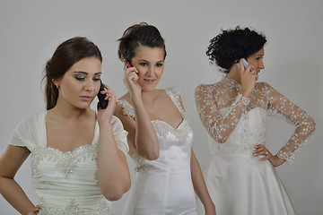 Image showing portrait of a three beautiful woman in wedding dress