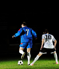 Image showing football players in action for the ball