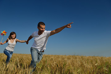 Image showing happy couple in wheat field